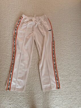 Nerdy track pants- authentic cream size medium
